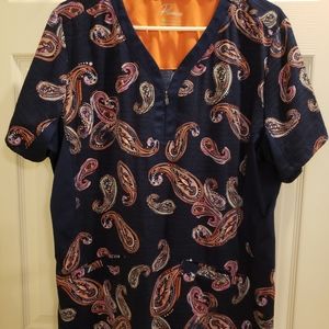 Healing Hands scrub top. Navy blue and paisley